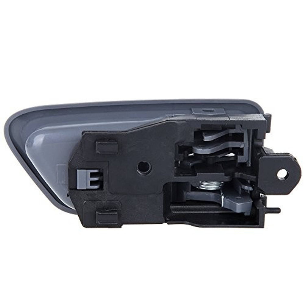 Interior door handle assembly showing latch parts inside dark plastic housing