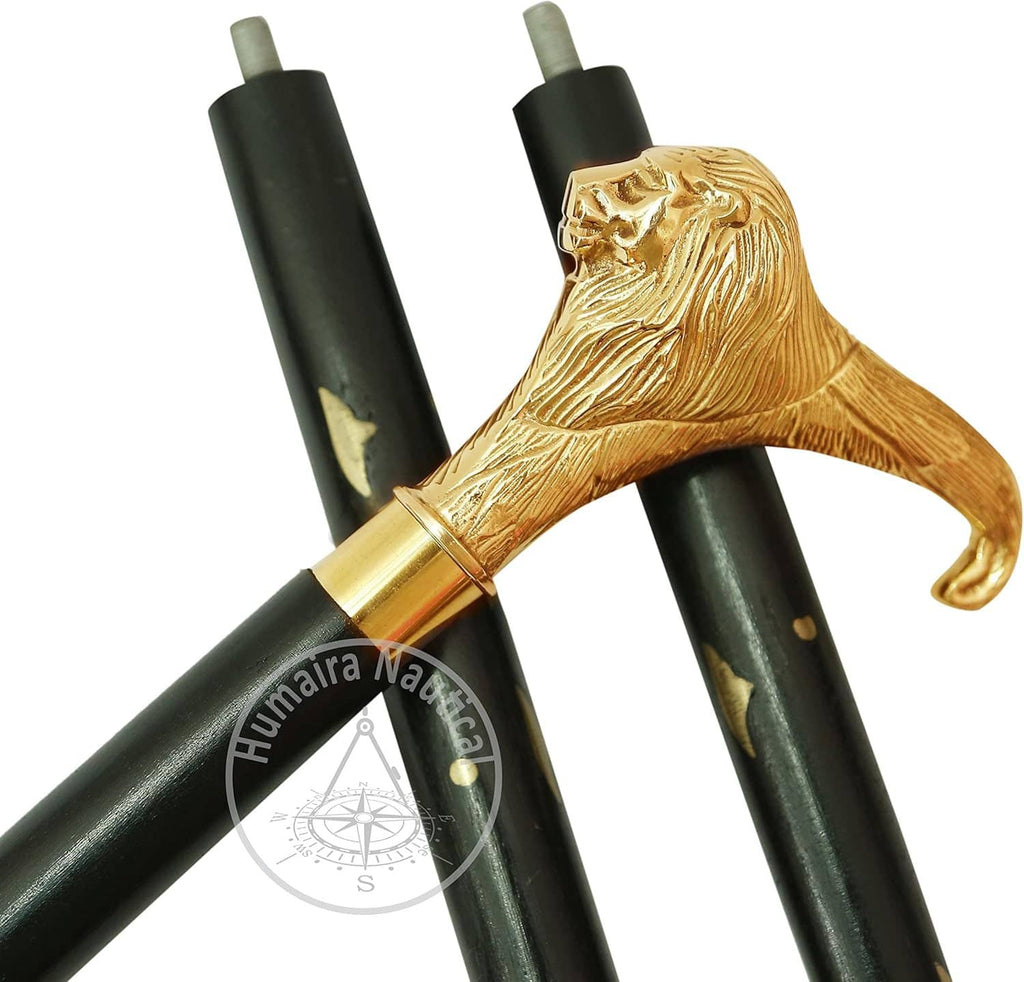 Brass lion-head handle with two black cane sections and gold ring at the joint