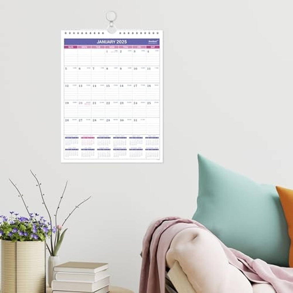 Small 2025 wall calendar hanging on wall, January 2025 month view
