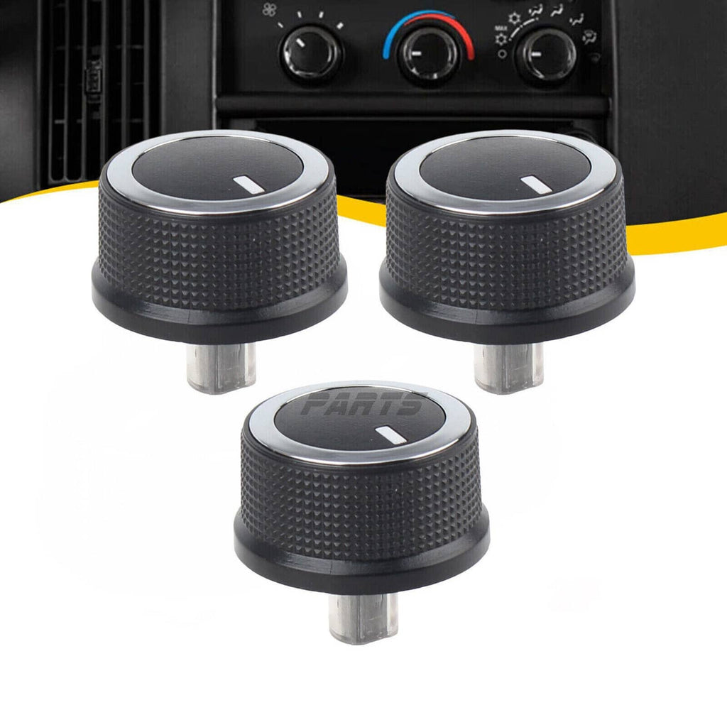 Set of three black HVAC temperature control knobs with silver trim and indicator arrow