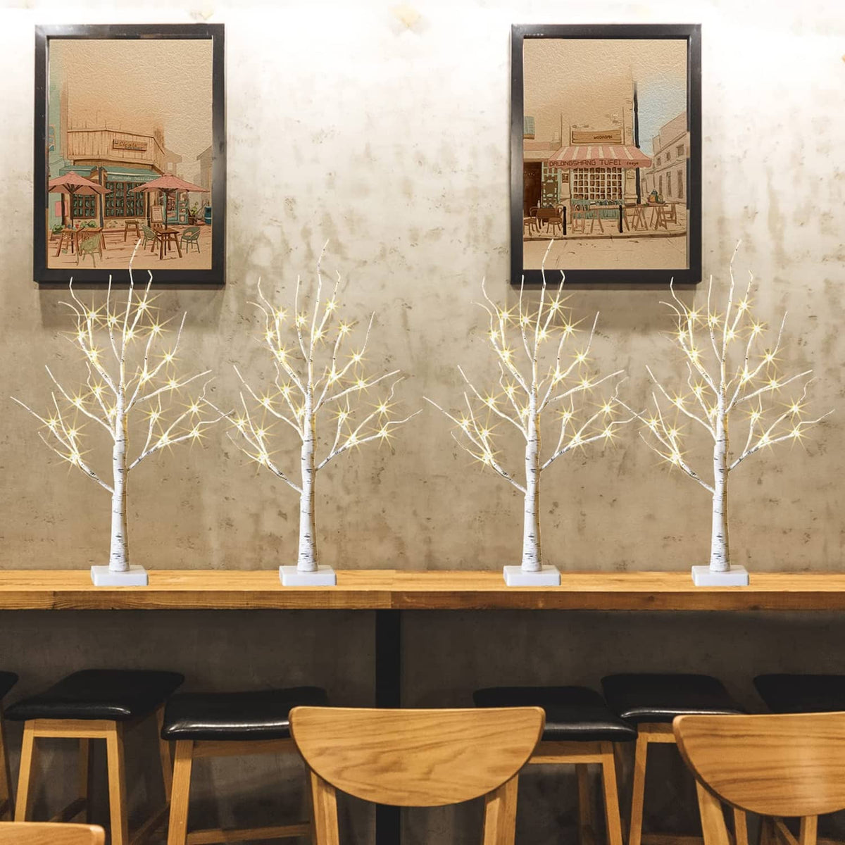 Lighted birch tree set of 4 with white trunks and warm string lights on bases