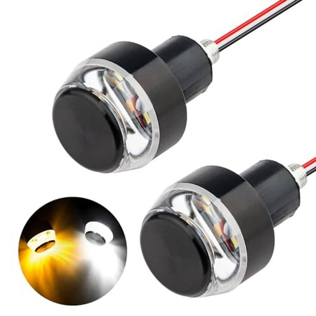 Motorcycle LED turn signal bulbs with black housings and reflective front lens, amber glow