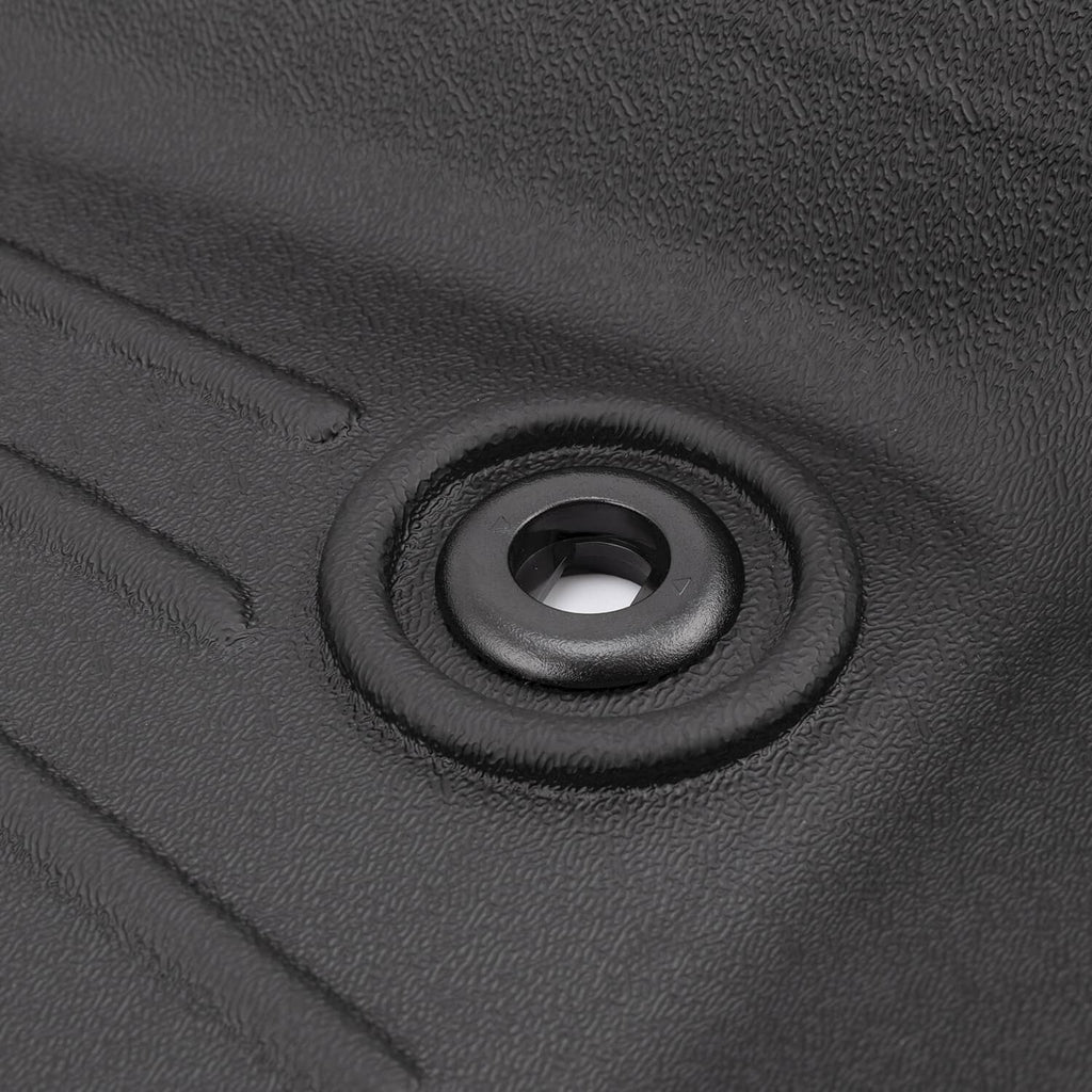 Close-up of black cargo liner mat with circular anchor grommet opening
