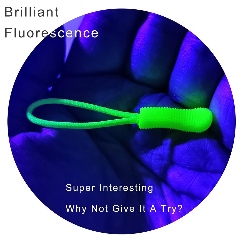 Neon green zipper pull with looped cord and ridged grip end