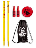 Outdoor Tipsy Toss yard game set with two yellow poles, red bottles, and flying disc plus bag