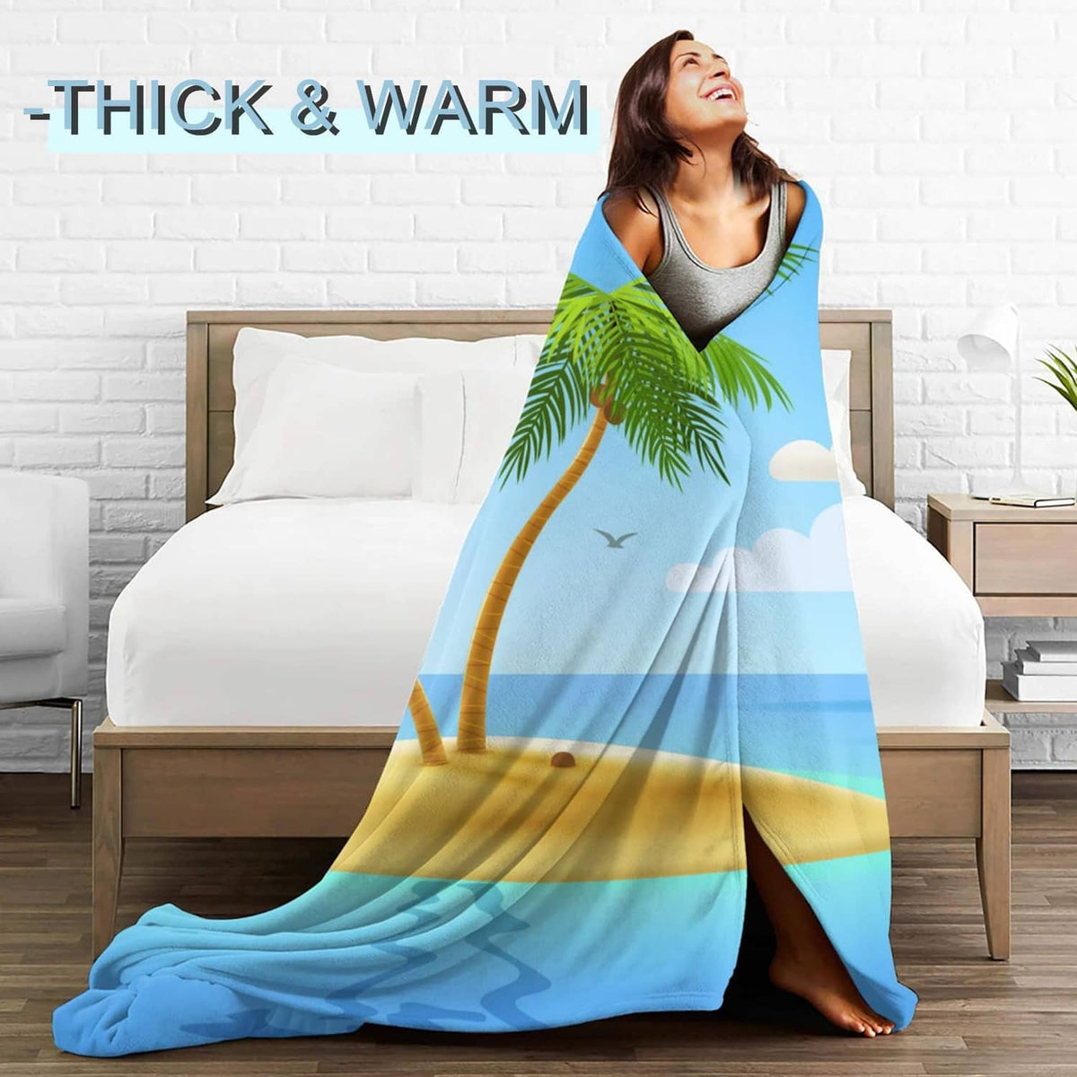 Light blue flannel blanket with palm tree and ocean wave graphic, cozy throw