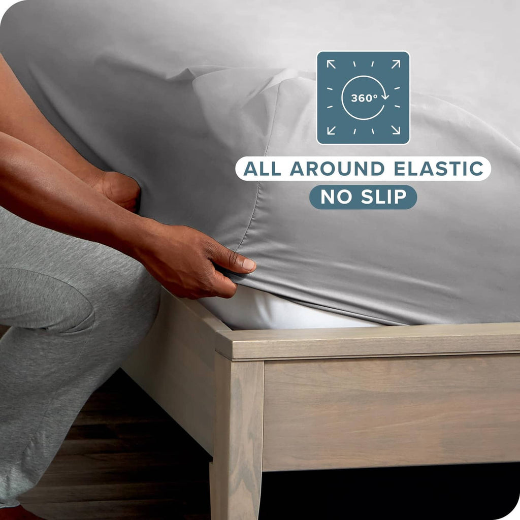 Light grey fitted sheet with all-around elastic hem for secure, no-slip fit