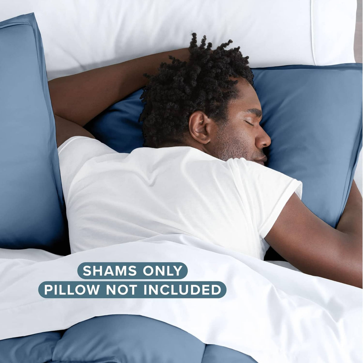 Blue pillow sham shown on a bed, matching set for standard pillows