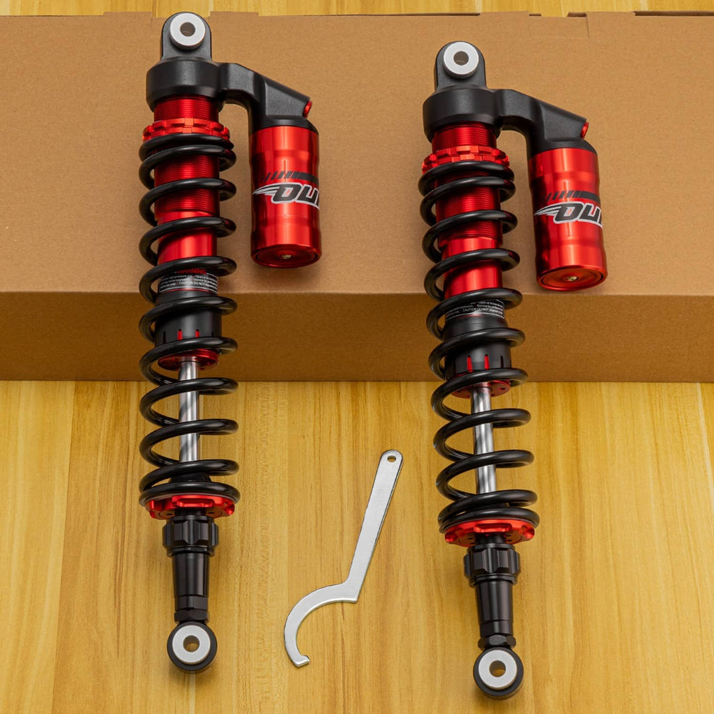 Pair of red-and-black front coil-over shocks with steel springs and mounting hardware