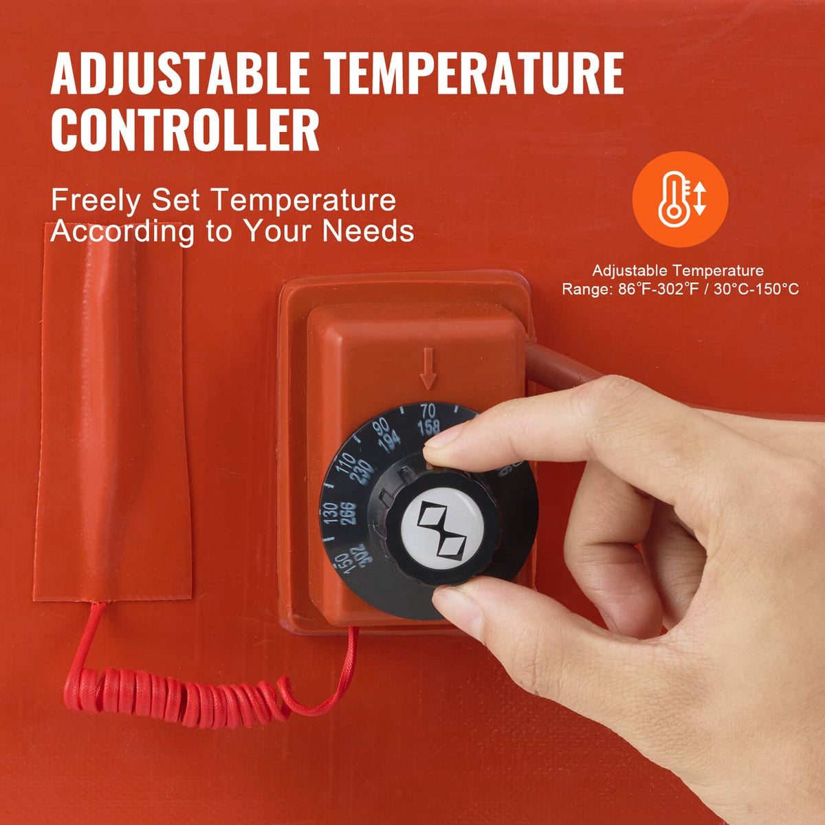 Adjustable temperature controller dial on orange drum heater wrap