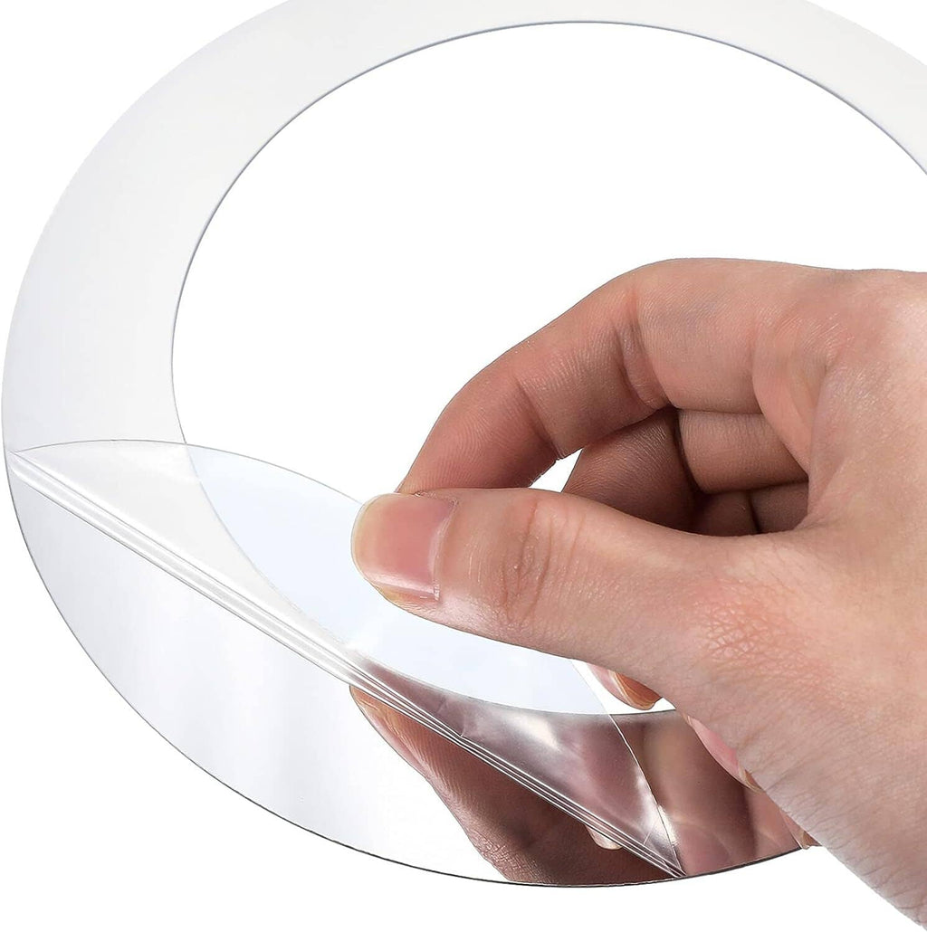 Close-up of reflective silver acrylic circle sticker with peelable protective film