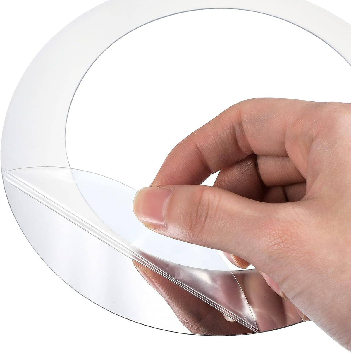 Close-up of reflective silver acrylic circle sticker with peelable protective film