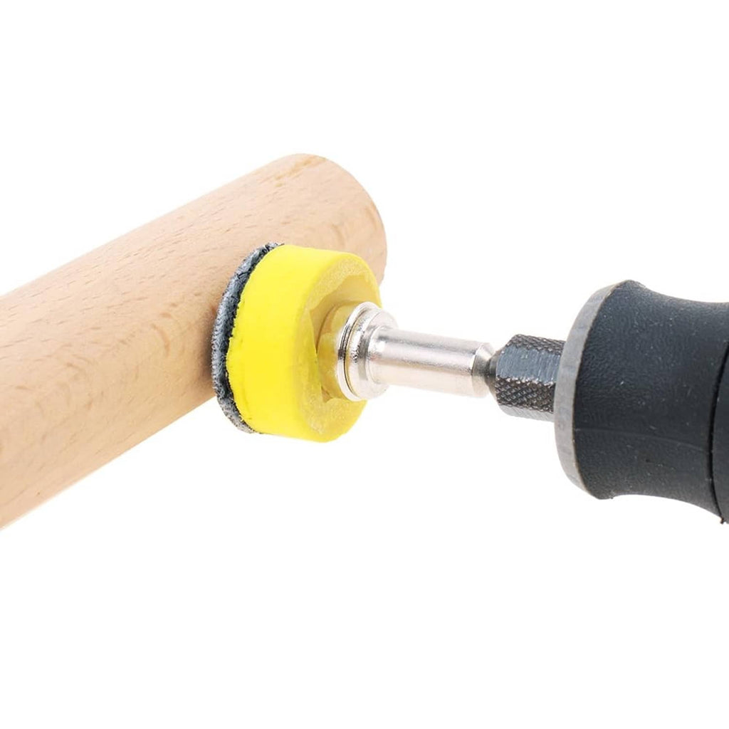 Yellow backing sanding disc mounted on 1-inch mandrel sanding a wooden surface
