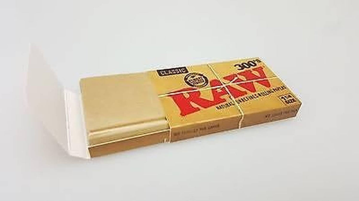 Rolling papers pack shown from side, Classic natural unrefined, 1 1/4 size, 300 count