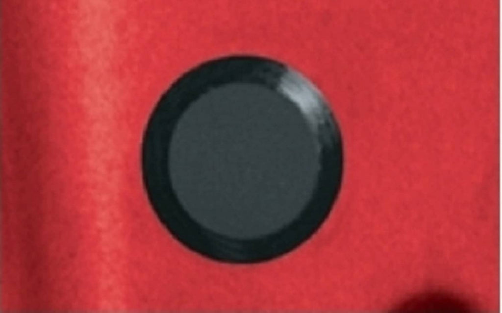 Black flush-mount hole plug seated in panel, round rubber disk with rim