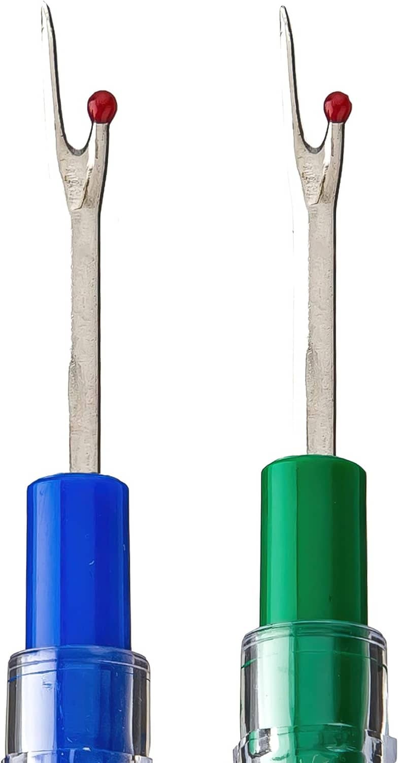 Blue and green fork-style seam ripper tools with red tips