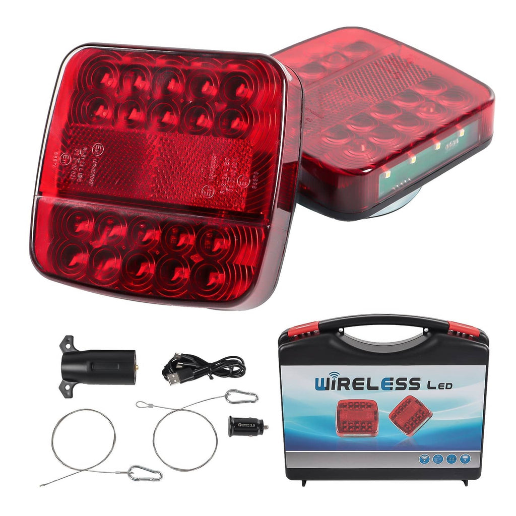 Wireless trailer tail light kit with two red LED lamps, controller box, and cables