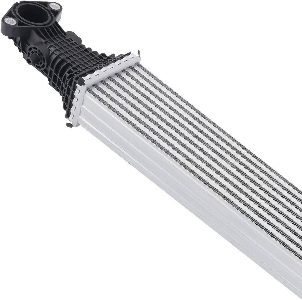 Turbo charge air intercooler with black plastic inlet flange and silver fin core