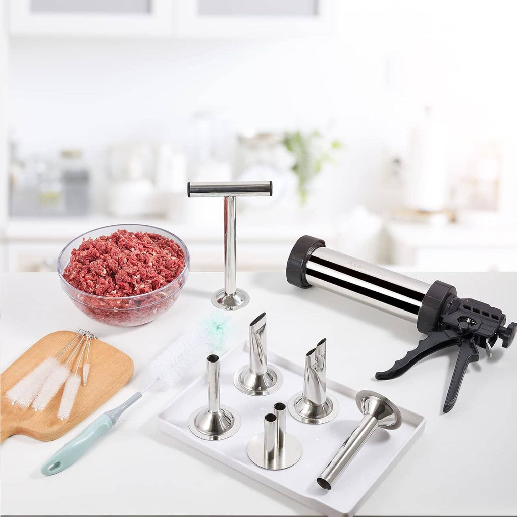 Stainless jerky cannon kit with nozzles, pusher, and cleaning brush plus ground meat bowl