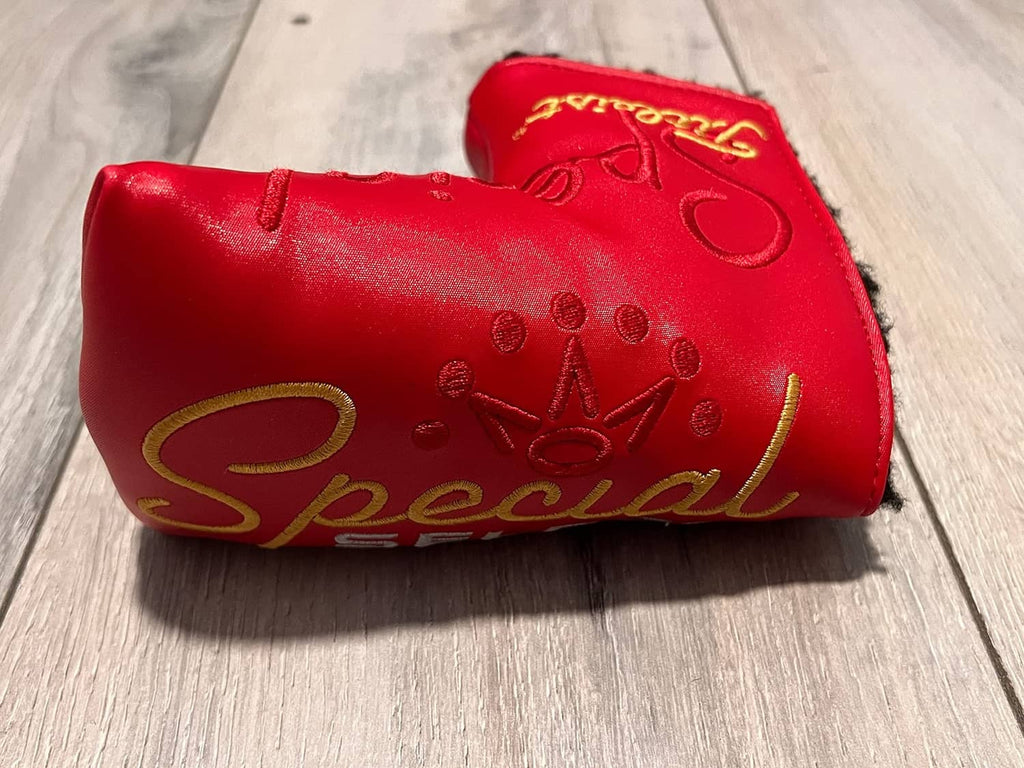 Red Scotty Cameron putter headcover with embossed Special script on side