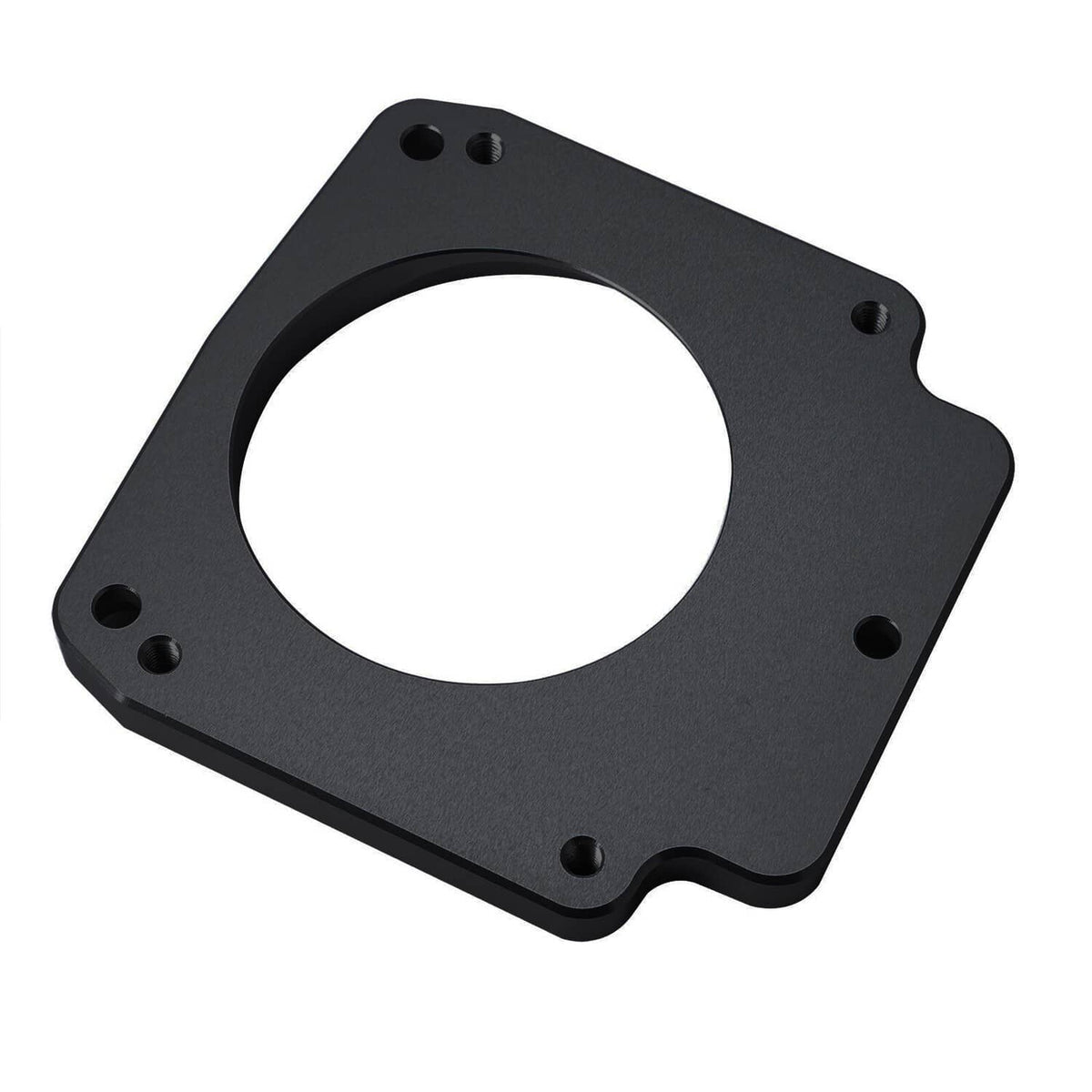 Black throttle body adapter spacer plate with round opening and corner mounting holes