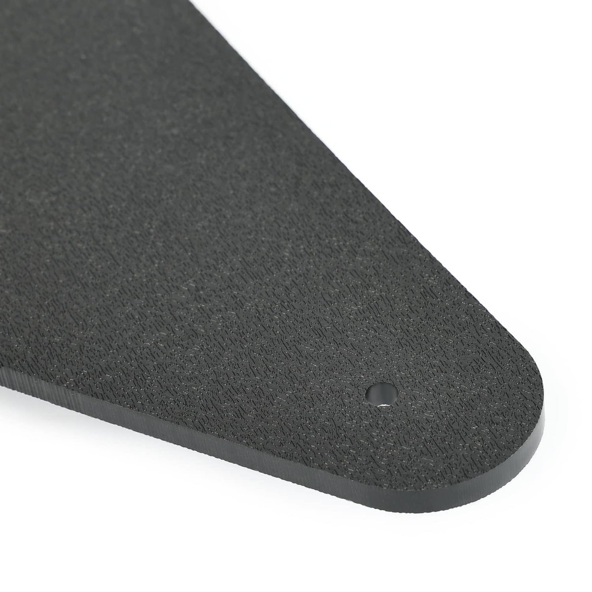 Close-up of black rudder blade edge with mounting hole