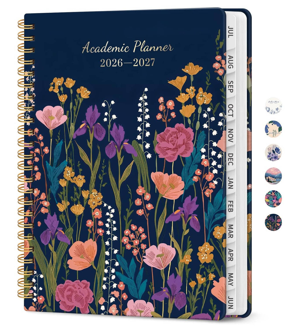 Academic planner, navy floral cover with twin-wire binding and month tabs on spine