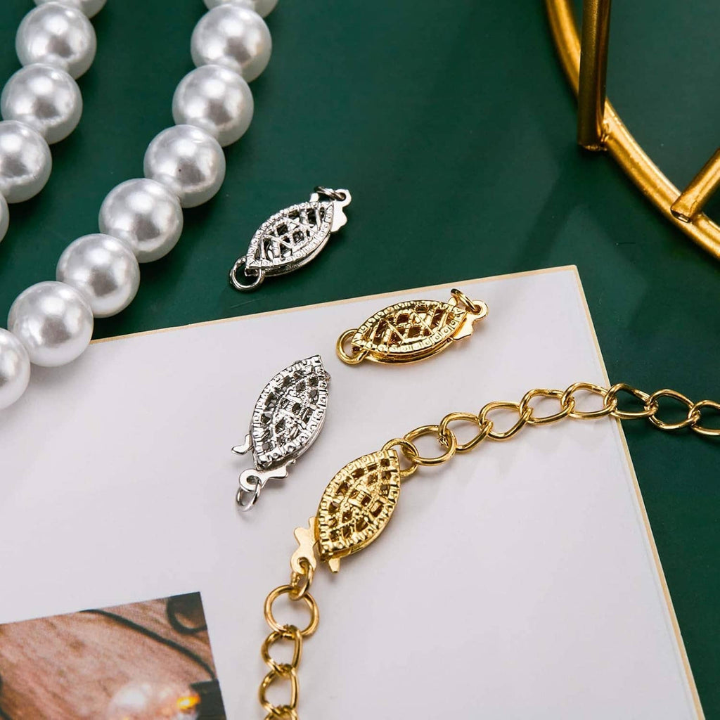 Oval filigree necklace clasp pieces with pearl-look details; gold and silver fish hook ends