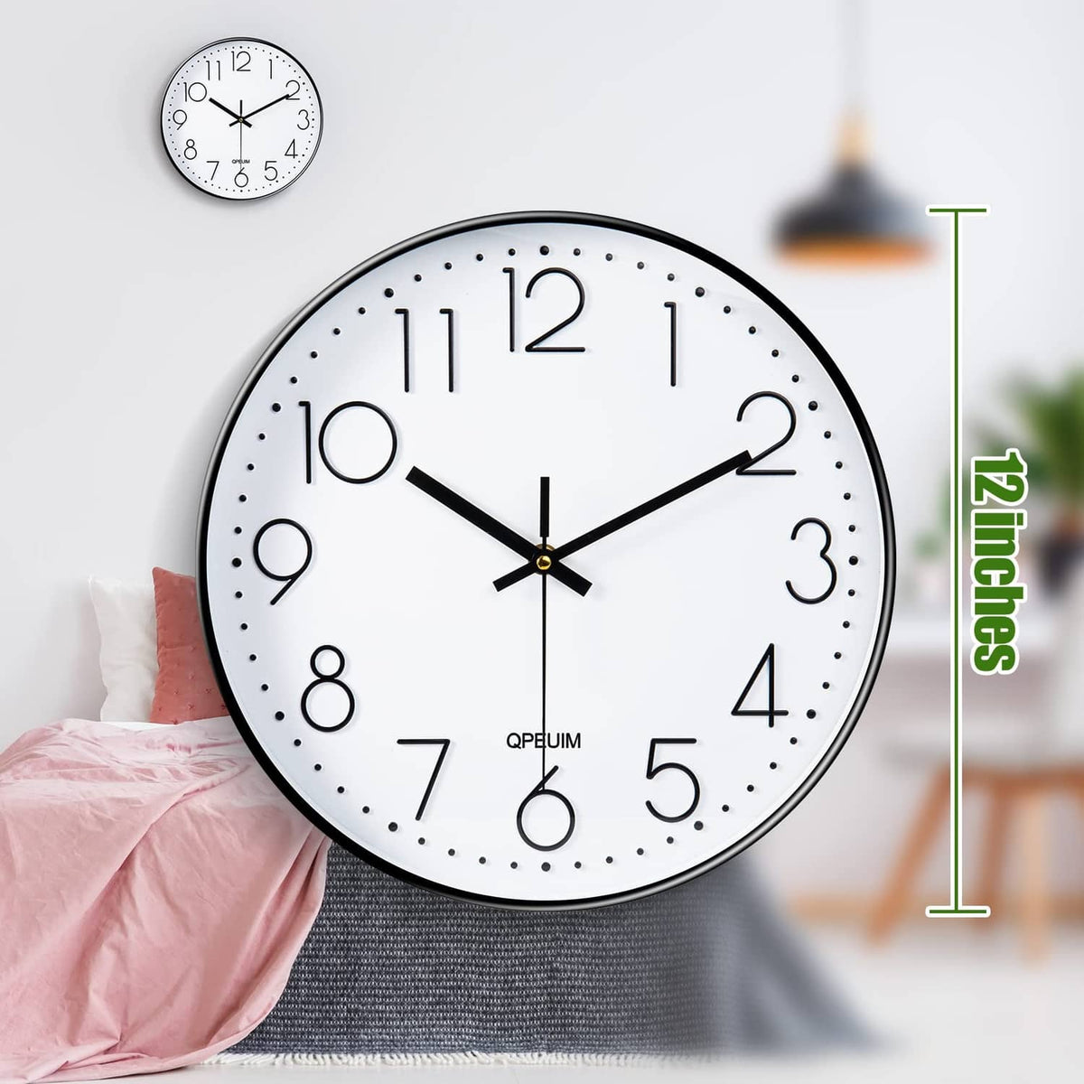 12-inch wall clock on wall with white dial, black rim, dot markers, black hands