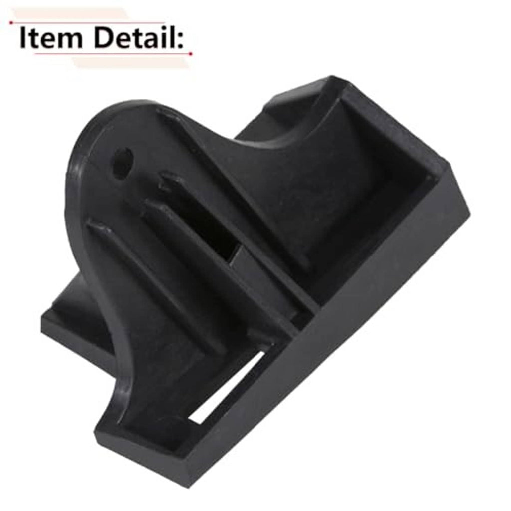 Black plastic driver-side seat trim bracket close-up, ribbed inner section
