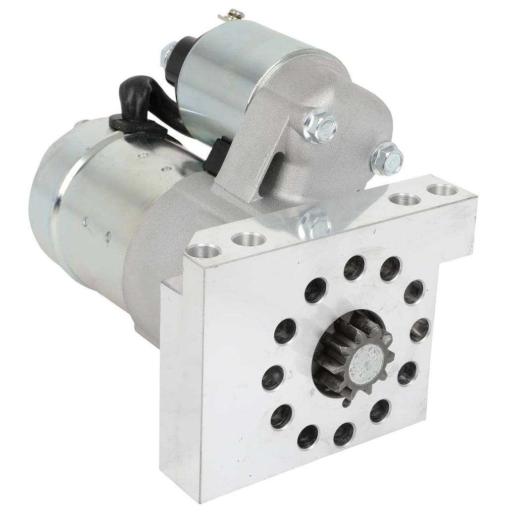 Compact starter motor with silver metal housing and side electrical terminals, bolt bracket