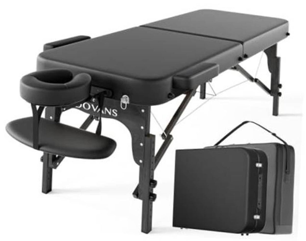 Foldable black massage table with padded top and adjustable base, includes headrest