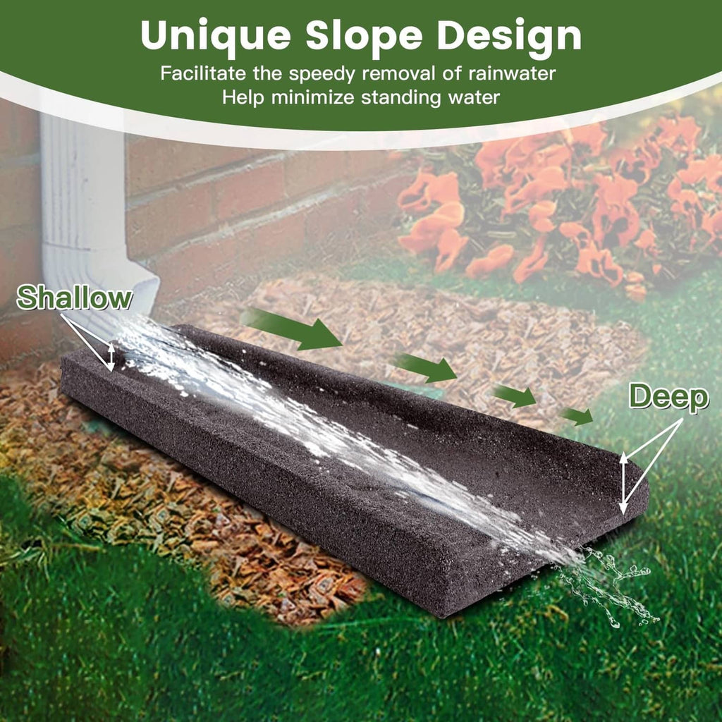 Brown rubber downspout splash block directing water flow over mulch and soil