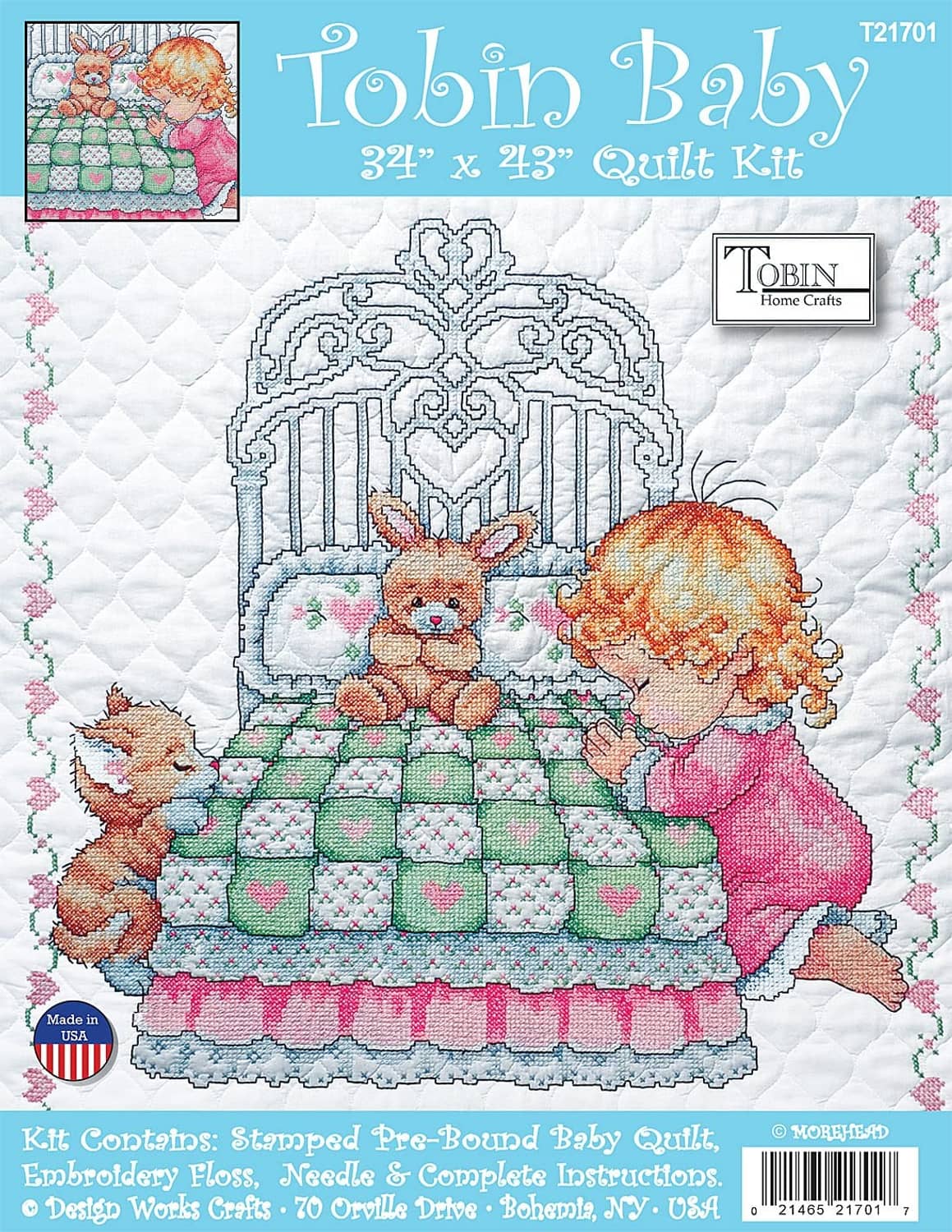 White quilt kit with stamped cross-stitch pattern showing girl kneeling beside bunny in cart