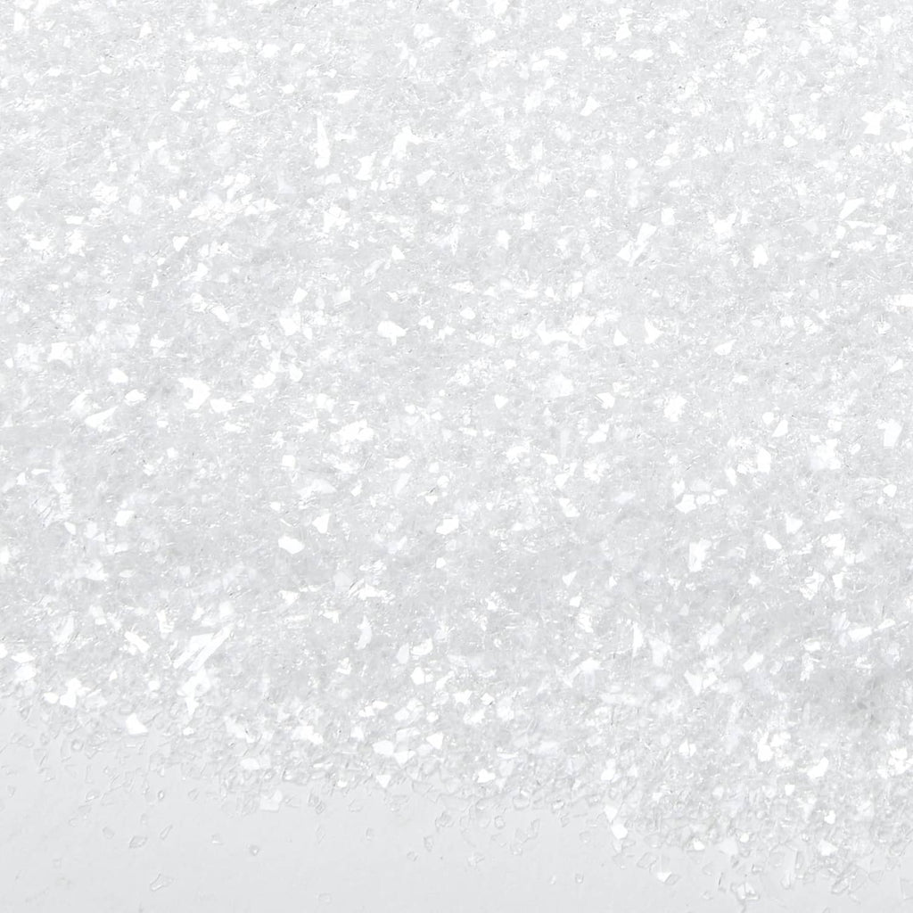 White diamond dust glitter texture on a light surface, fine sparkle flakes