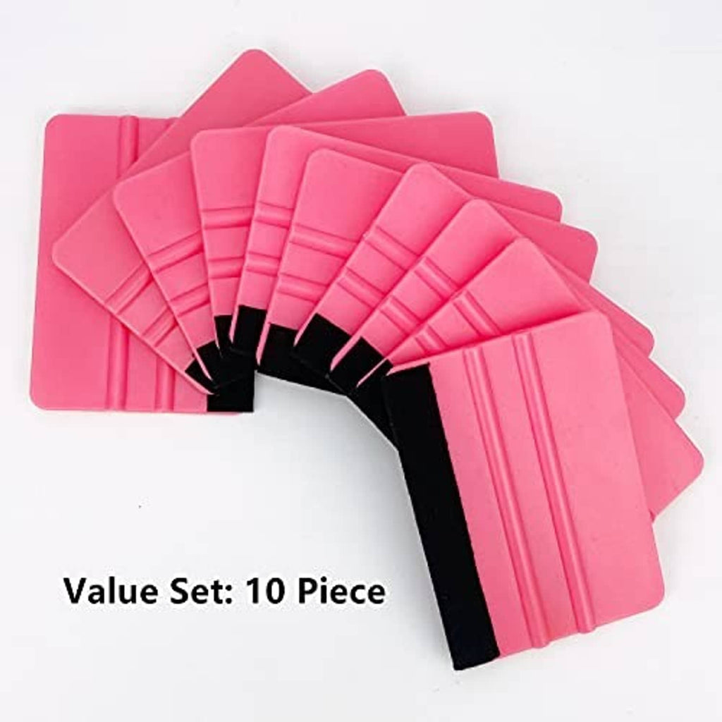 Set of pink vinyl squeegee tools with black felt edges, fanned arrangement