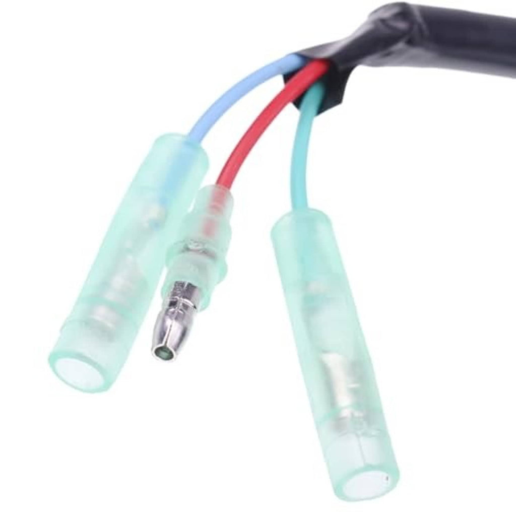 Close-up of translucent electrical connectors on a black cable with red and blue wires