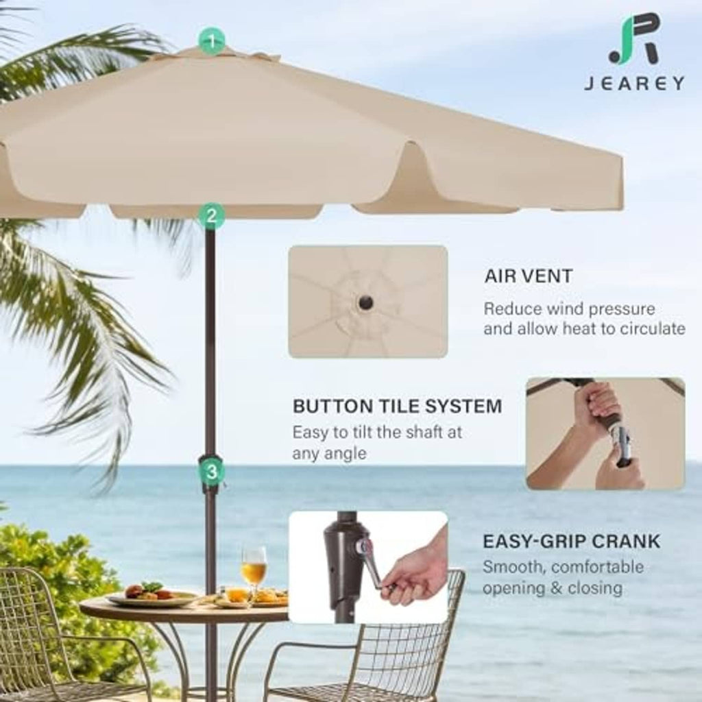 Beige patio umbrella close-up showing crank tilt control on center pole