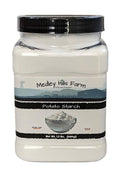 Reusable potato starch container with black ribbed cap and front label, 1.5 lb.