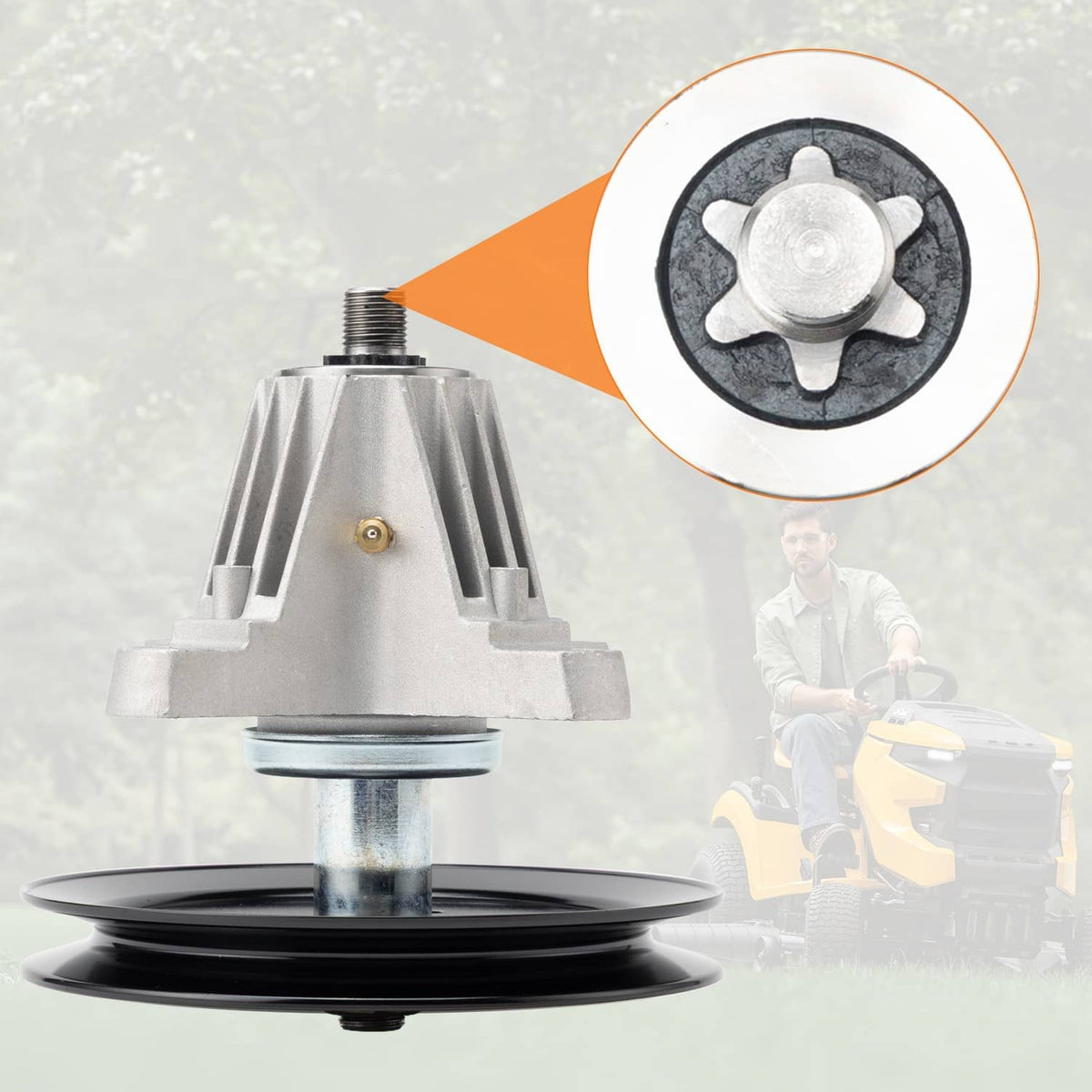 Deck spindle assembly with black pulley and silver housing, close-up insert detail