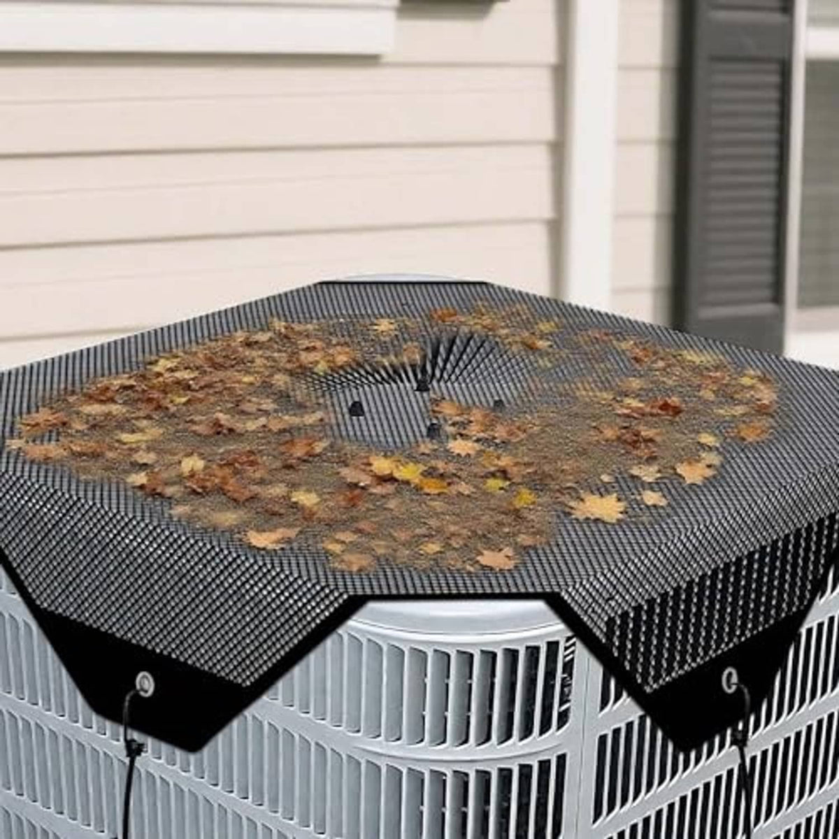 Outdoor AC cover with black textured mesh top and vented grille sides on condenser