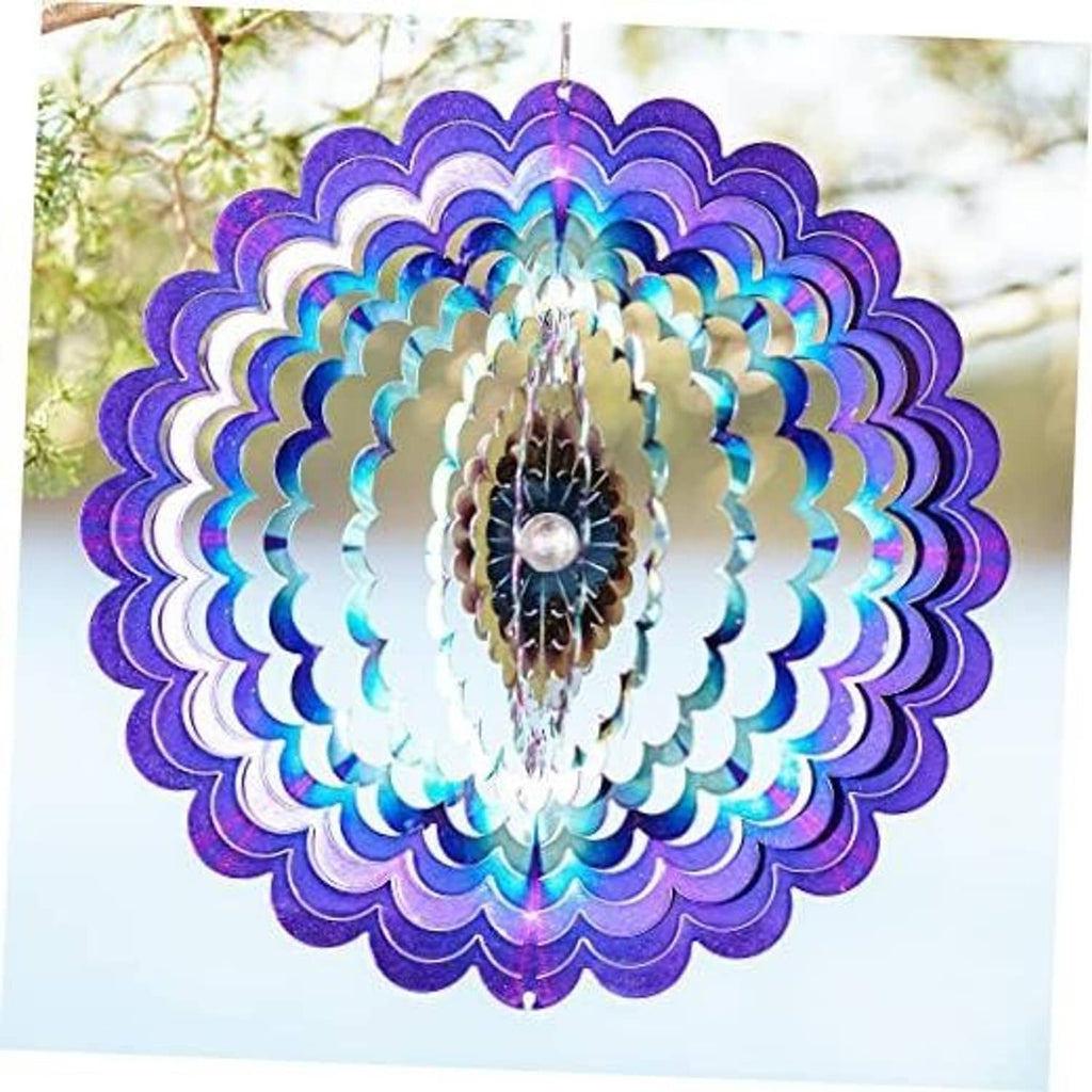 Floral wind spinner with purple-blue layered petals and central metal medallion