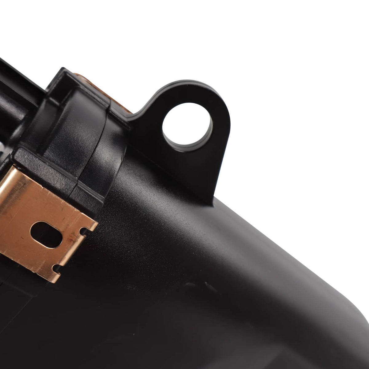 Fuel pump module kit close-up of black housing with copper contact bracket