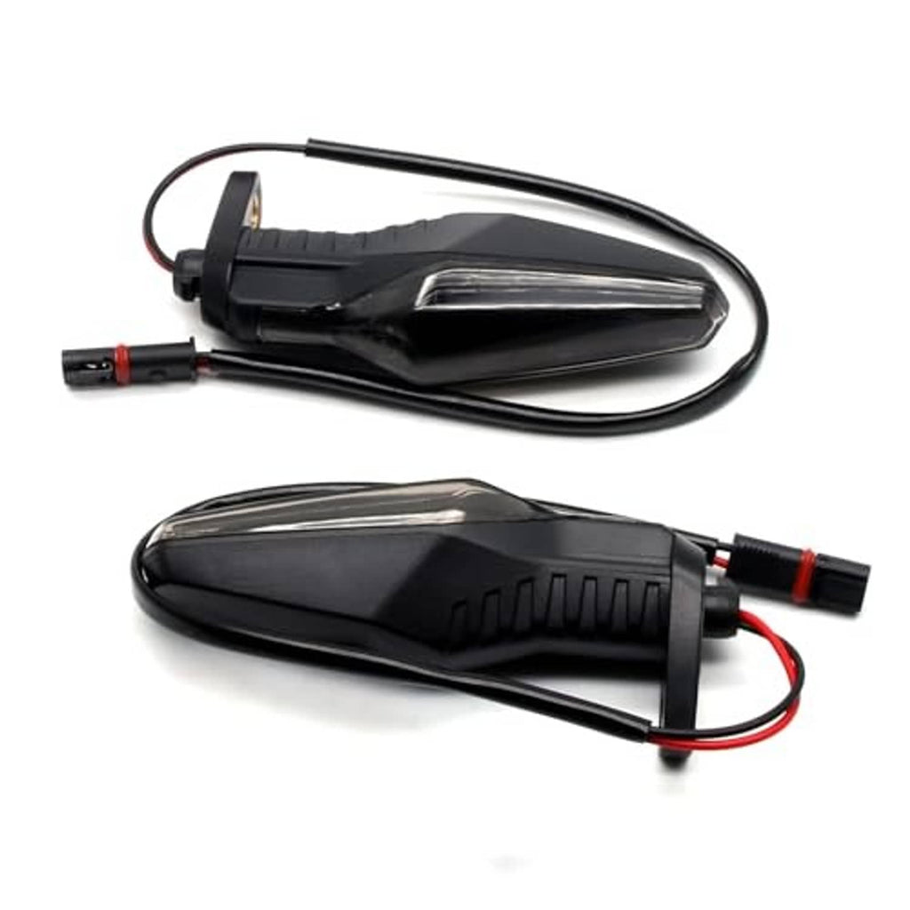 Motorcycle turn signal lights with smoked lenses, black housings, and red/black connectors