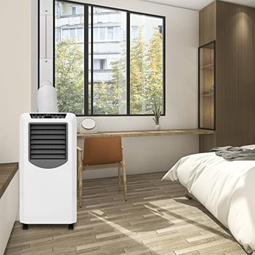 Portable air conditioner with installed window exhaust hose and accordion panel kit