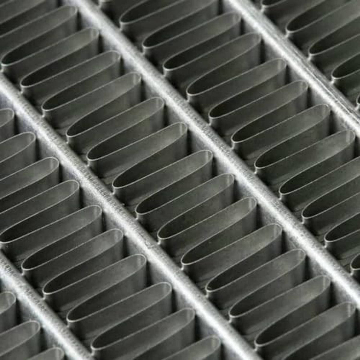 3-row radiator fan shroud radiator fins and channels, close-up of silver core