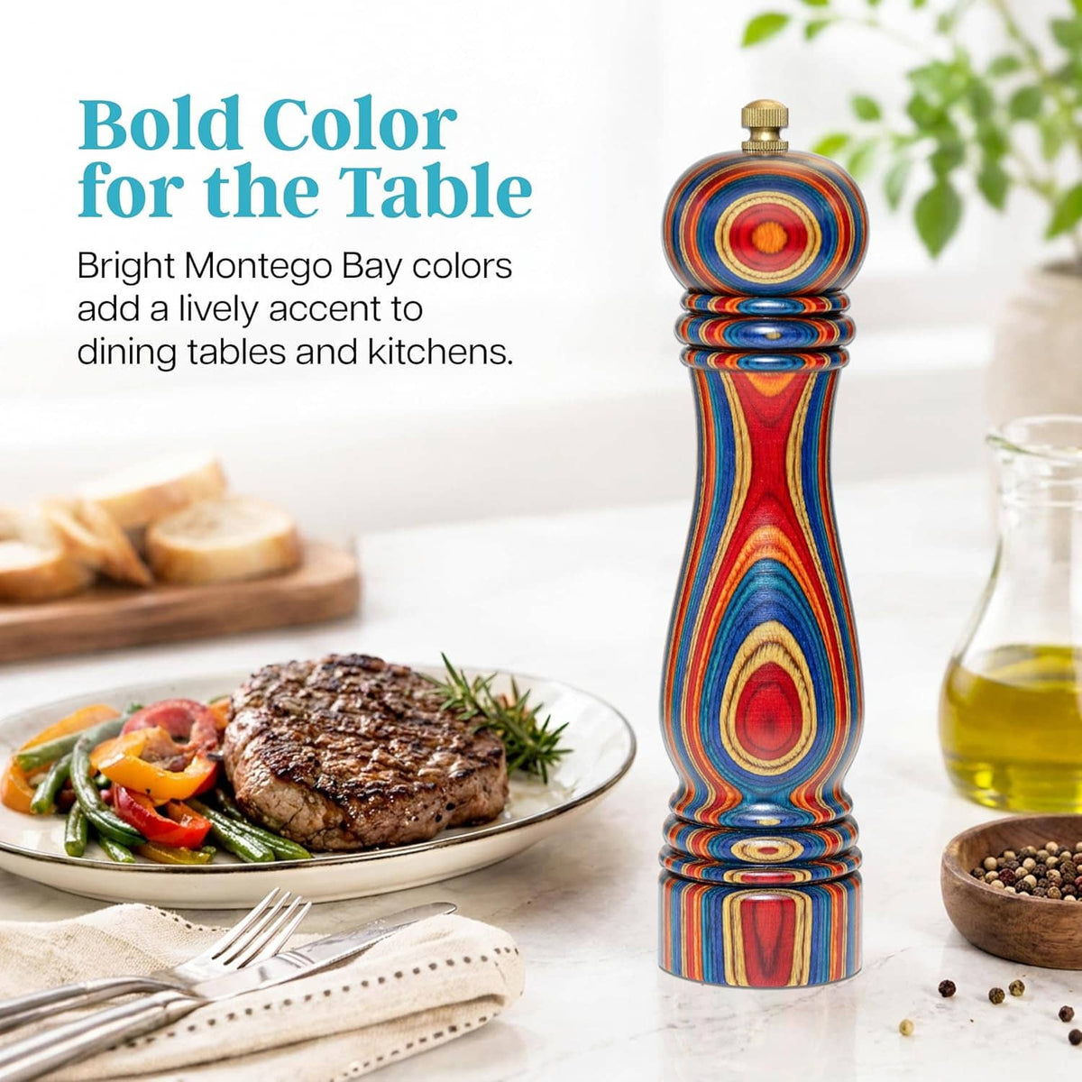 Colorful striped wooden pepper grinder with brass cap, standing upright