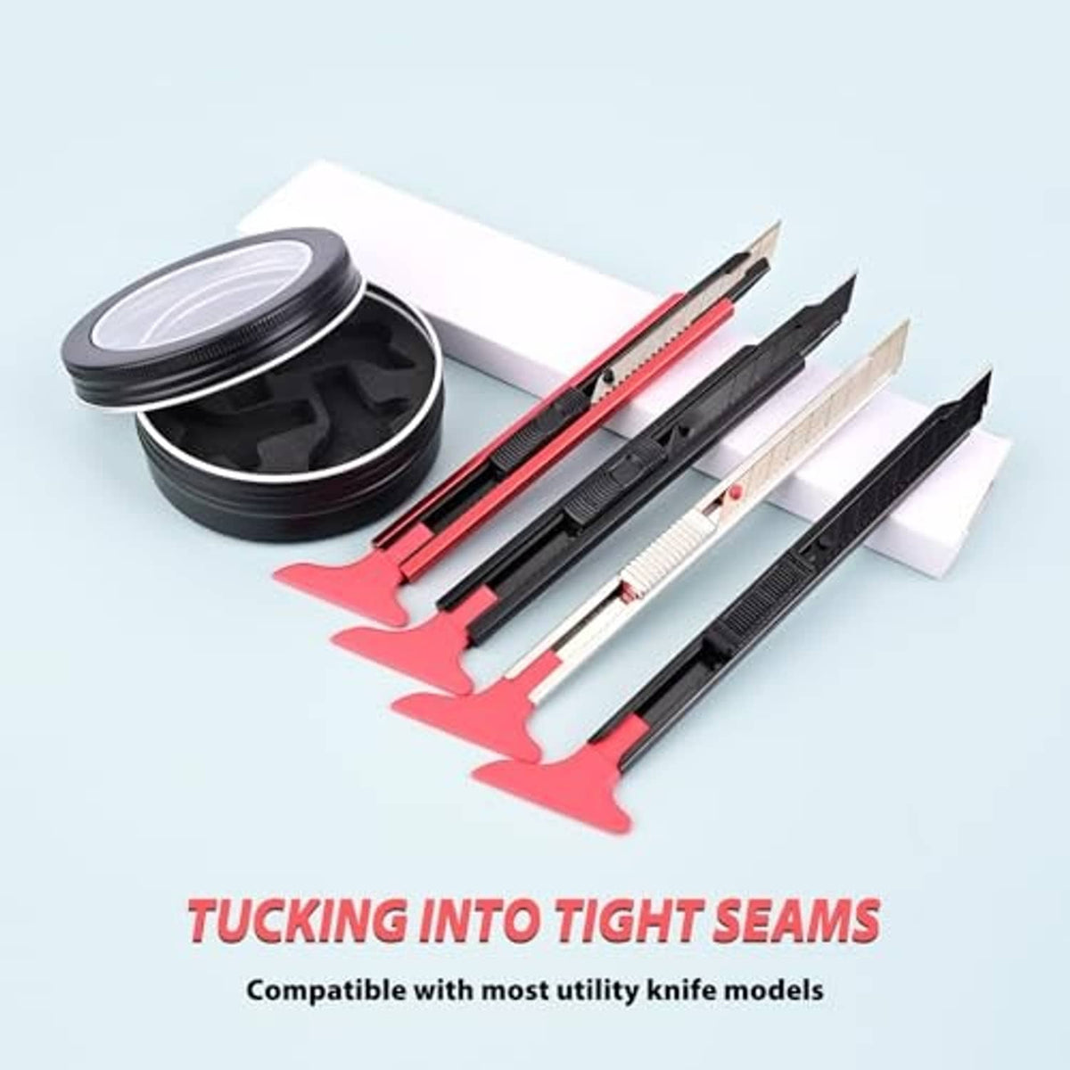4-piece vinyl wrap knife tucker set with multiple red-handled tools and round cases