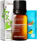 Peppermint essential oil bottle with matching packaging and face mask boxes