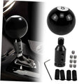Black 8-ball gear shift knob with threaded adapter, bolts, and rubber covers